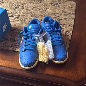 Nike Blue Athletic Sneakers with White Accents